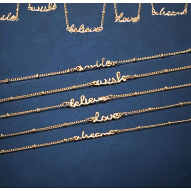 Avon Gold Tone Slogan Bracelet - Love